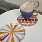 Teller mit Goldrand gemustert