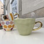 Becher mit goldenem Henkel – Bild 5